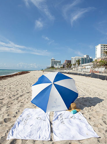 Umbrellas and beach towels